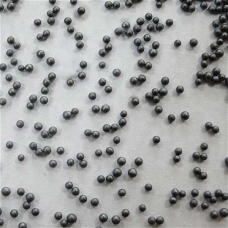 Individual cast steel shot particles showing their shape
